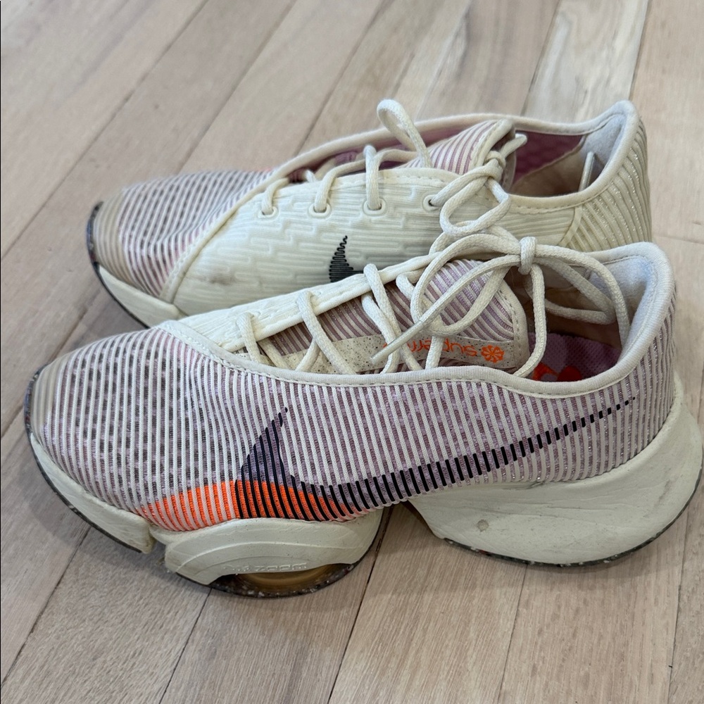 Nike Cream and Orange Striped Sneakers
